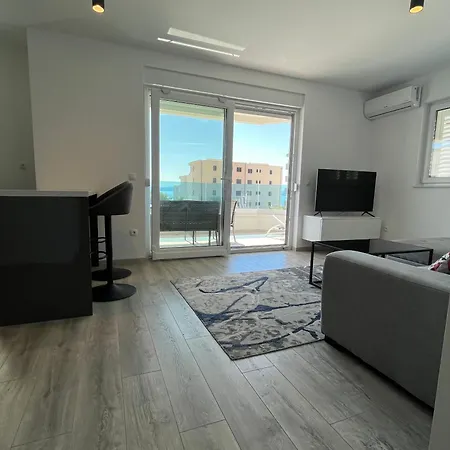 Апартаменты Neue Familienwohnung Meerblick - Klima & Parkplatz