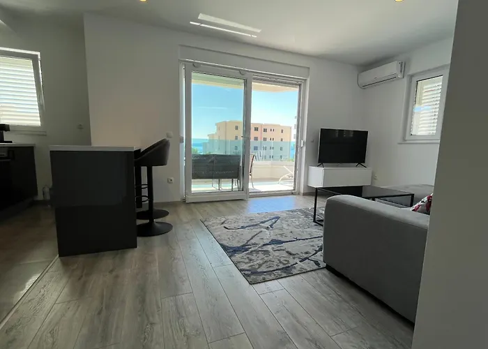 Апартаменты Neue Familienwohnung Meerblick - Klima & Parkplatz